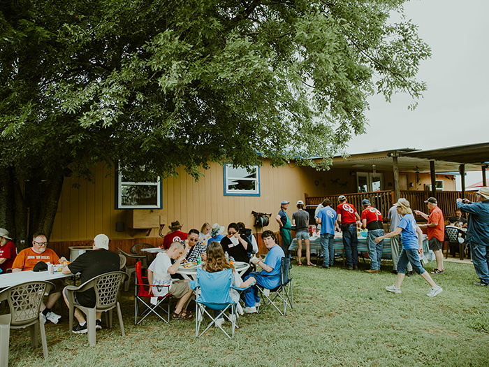Group eating picnic lunch