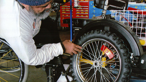 Wandus installing the new tires.
