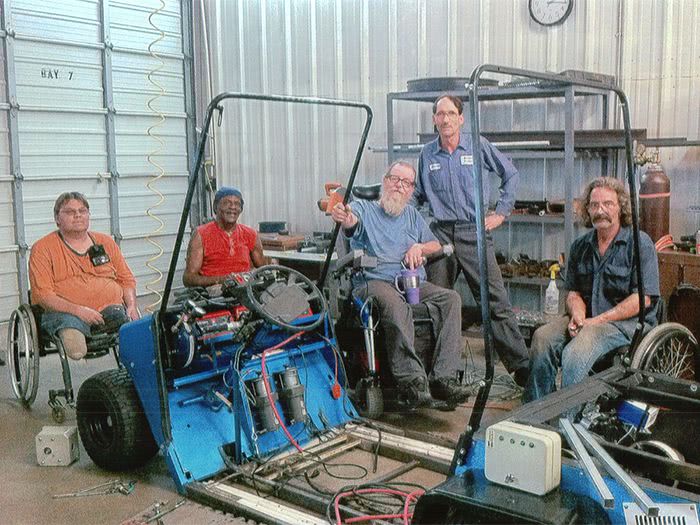 Tony, Tommie, Jim, Harrold, and Ed pause for a photo during work on the Blue Hybrid Kart.